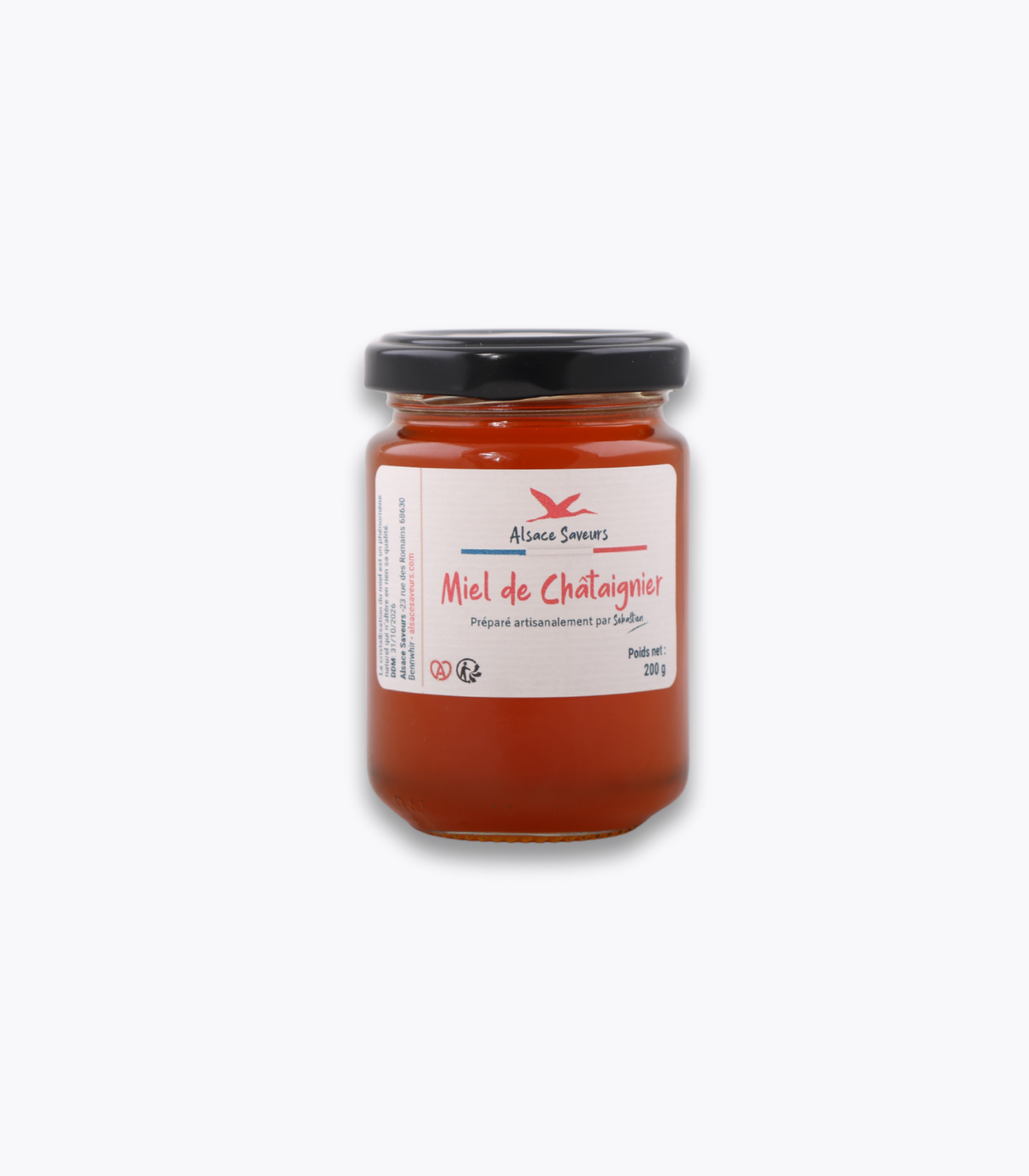 pot de miel de châtaignier sur fond gris